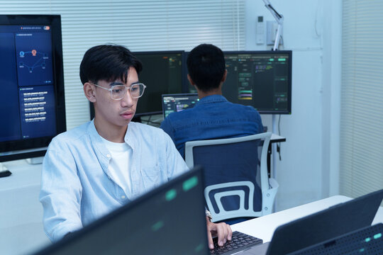 Programmer and Developer Working on Digital Code