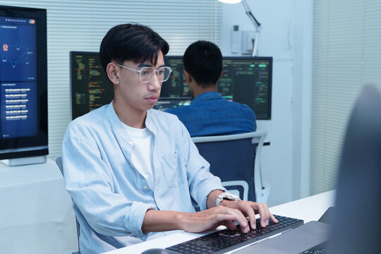 Programmer Coding on Computer for Digital Technology Development