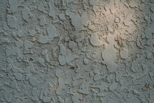 Close-up view of textured concrete wall surface