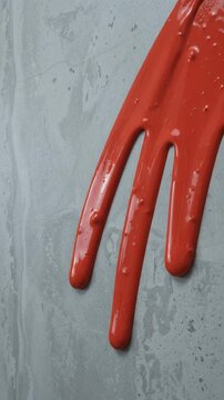 Vibrant Red Paint Dripping Down a Textured Grey Concrete Wall Surface Creating an Abstract Artistic Background