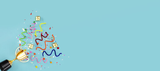 Fototapeta premium happened success background. Celebrating that Gold has trophy confetti blue placed award . Celebrating the success that has happened, Gold trophy placed on a blue background. 