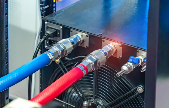 server racks with a liquid cooled supercomputer system with tube  