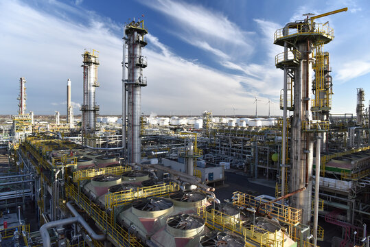 pipelines and buildings of a refinery - industrial plant for fuel production