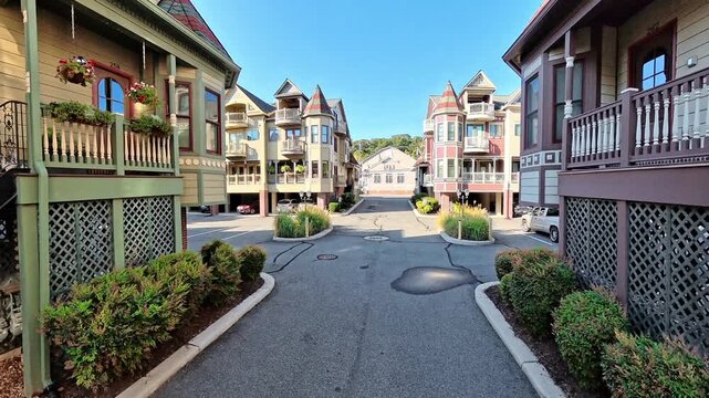 Wide video view reveals victorian courtyard during smooth camera motion through Occoquan Virginia.
