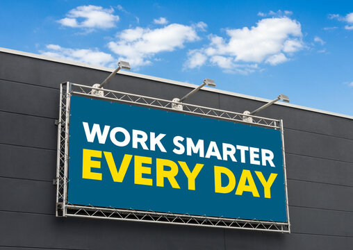 Work Smarter Every Day written on a billboard