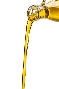 Golden Cooking Oil Pouring from Glass Bottle on Transparent Background