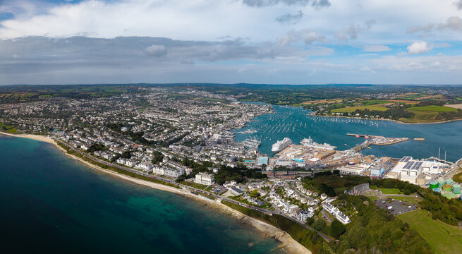 Aerial panorama landscape of Falmouth townscape and harbour in Cornwall, UK surrounded on both side by water