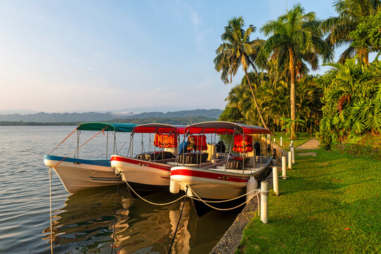 Boat transportation to the Rio Dulce at sunrise, Livingston, Guatemala.