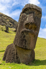 Moai Tukuturi at Rano Rarakuon easter island. Beautiful Moai Statues with beautiful blue sky in the background and green gras in the foreground  © Sven Taubert