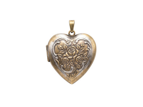 Heart-shaped brass locket with engraved rose flower design isolated on black background, capturing vintage antique romance and sentimental nostalgia for anniversary greeting card design.