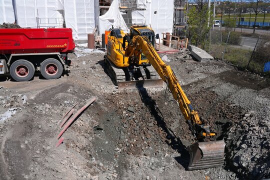 OSLO, NORWAY - MAY 6, 2026: Komatsu PC138US short tail swing excavator at a construction site in Oslo, Norway.