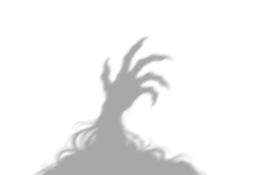 A frightening and eerie shadow depicts a decaying hand slowly rising from the dark earth creating a ghostly unsettling visual for horror and spooky themes