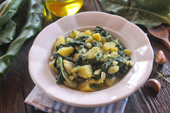 Traditional Croatian Blitva - Swiss Chard with Potatoes, Garlic and Olive Oil, Dalmatian Cuisine.

 "Blitva na leso", a classic Croatian and Mediterranean side dish made of boiled Swiss chard, cubed p