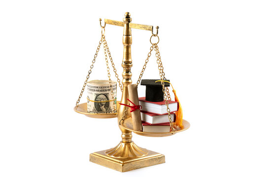 An academic cap, books, a diploma, and a stack of US 1 dollar bills on the pans of a balance scale.