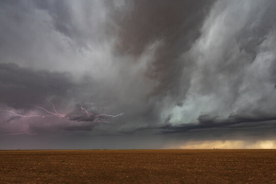 Lightning striking during storm over open field in floydada, texas