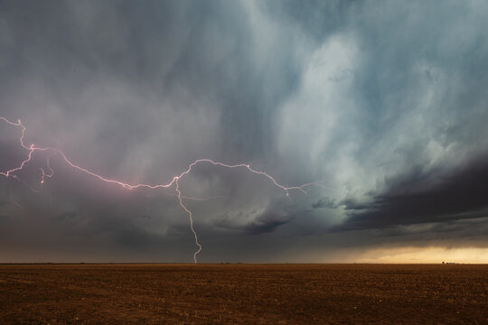 Lightning strike over stormy field in floydada texas