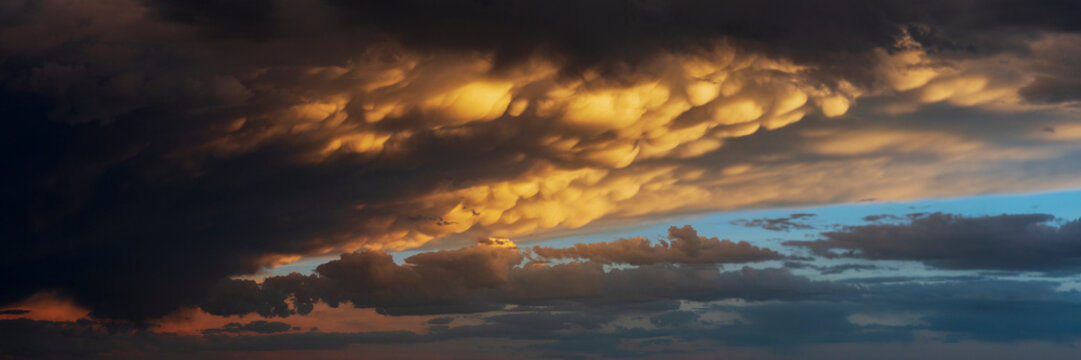 Mammatus clouds glowing at Sunset near post, texas