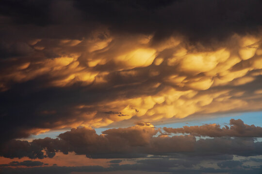 Mammatus clouds illuminated at Sunset over post texas Great Plains