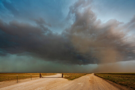 Storm Cell and Dust Cloud over dirt roads in dalhart, texas