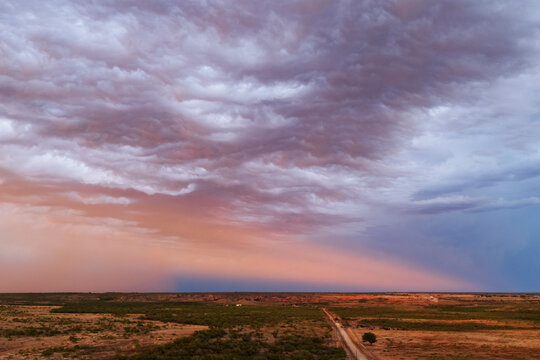 Anti-crepuscular ray at Sunset over texas rural landscape