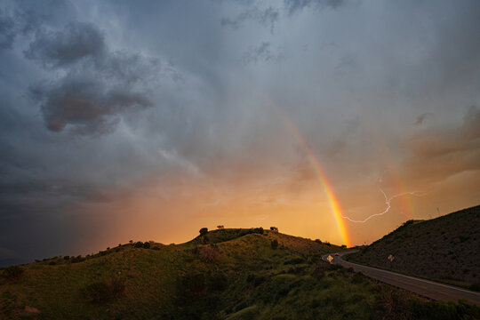 Rainbow and lightning storm on Arizona highway 83
