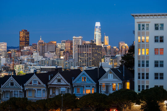 San Francisco skyline with victorian Painted Ladies at evening