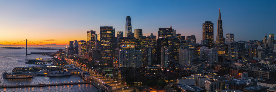 San Francisco cityscape at dusk with waterfront and pier 7