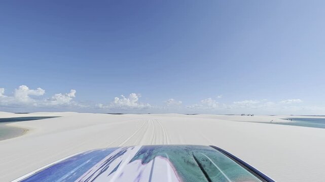 View of the white sand dunes and turquoise lagoons of Parque Nacional dos Lencois Maranhenses in MA, Brazil.