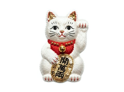 White ceramic lucky cat figurine with raised paw, red collar and gold coin, traditional Asian fortune symbol for prosperity and good luck in home or business decor