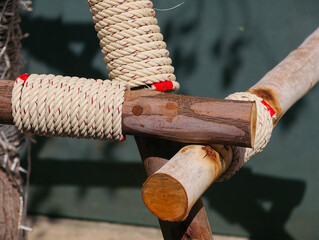 rope on wooden background © Saravut