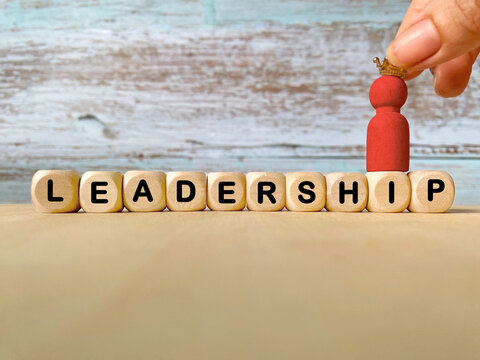 Leadership Concept with Red Leader Figure
