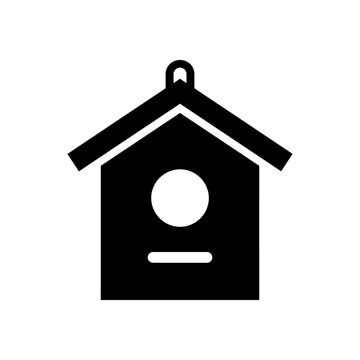 Birdhouse silhouette with round entrance hole and wooden perch for garden bird care projects isolated on transparent background simple vector icon illustration.