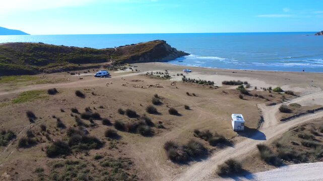 Campervan on Dalan Beach Albania Aerial Drone Shot 4K