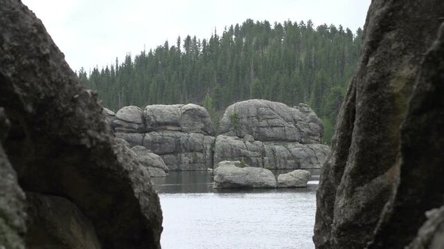 Large rocks in middle of lake

