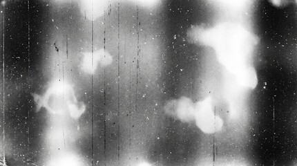 Obraz premium Old film texture with scratches, noise and light leaks. Realistic transparent overlay film texture in black-white, dust and grain. Distressed retro movie or photo negative effect of cinema nostalgia