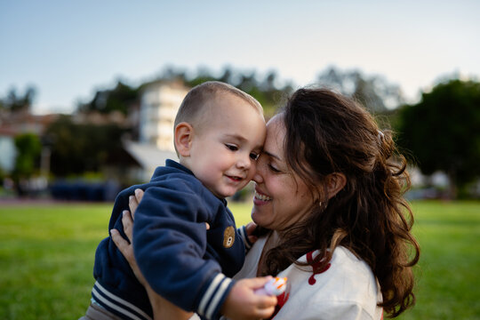 Mother and son sharing happy outdoor moment
