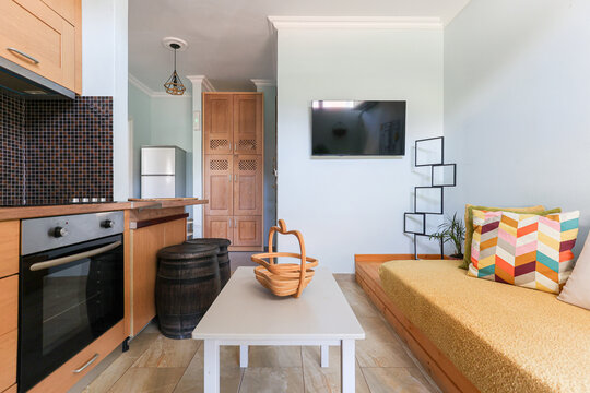 Cozy Interior of a Small Apartment With Kitchen and Living Area