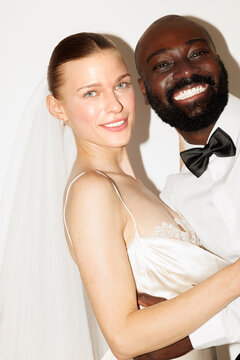 Smiling newlyweds