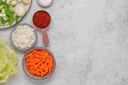 Korean food prep flat lay, chopped vegetables for kimchi with empty space