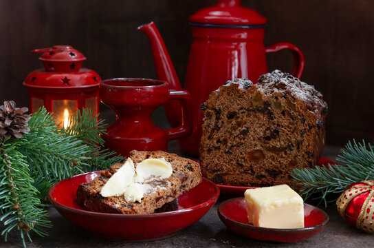 Traditional Homemade Christmas Bara Brith Welsh Fruit Tea Bread with Dried Fruit and Spices with butter