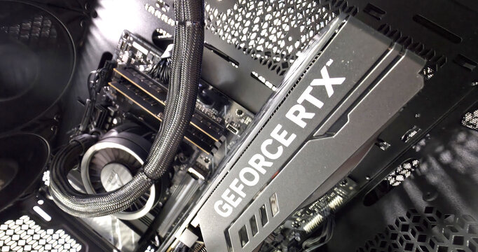 GeForce RTX GPU and AIO cooler inside an open black computer case