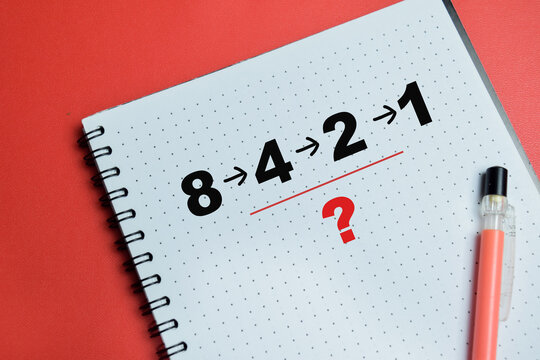 Concept of mathematical sequence and logic puzzle write on book isolated on table. For education and problem solving
