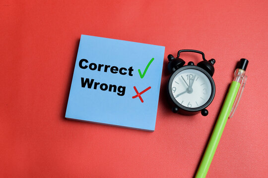 Concept of correct and wrong write on sticky notes isolated on table. For decision and evaluation