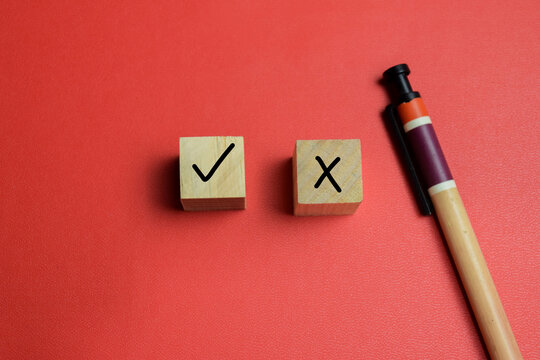 Concept of right or wrong decision text on wooden blocks. For choice and evaluation