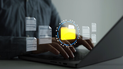 Obraz premium Document management system(DMS) with file folders and archive storage. Digital organization helps manage records, data and business information. 