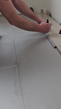 Measuring and marking a surface for installation work