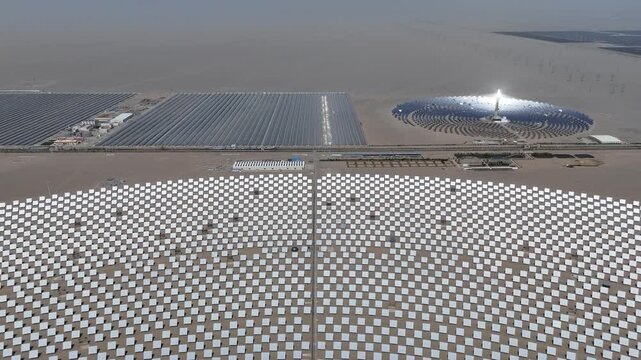 Panoramic view of molten salt tower CSP power station in desert
