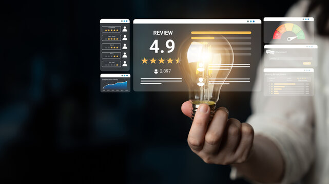 A conceptual image showcasing a hand holding a lightbulb amidst a digital interface displaying user ratings, emphasizing innovation and the influence of technology. Ledger