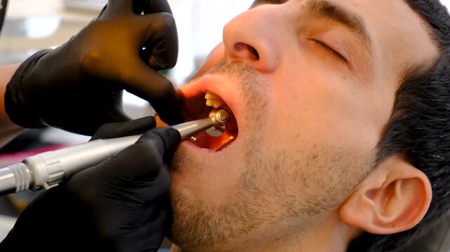 A man at a dentist appointment. Selective focus.