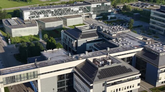 High angle drone perspective of modern business district and office complex